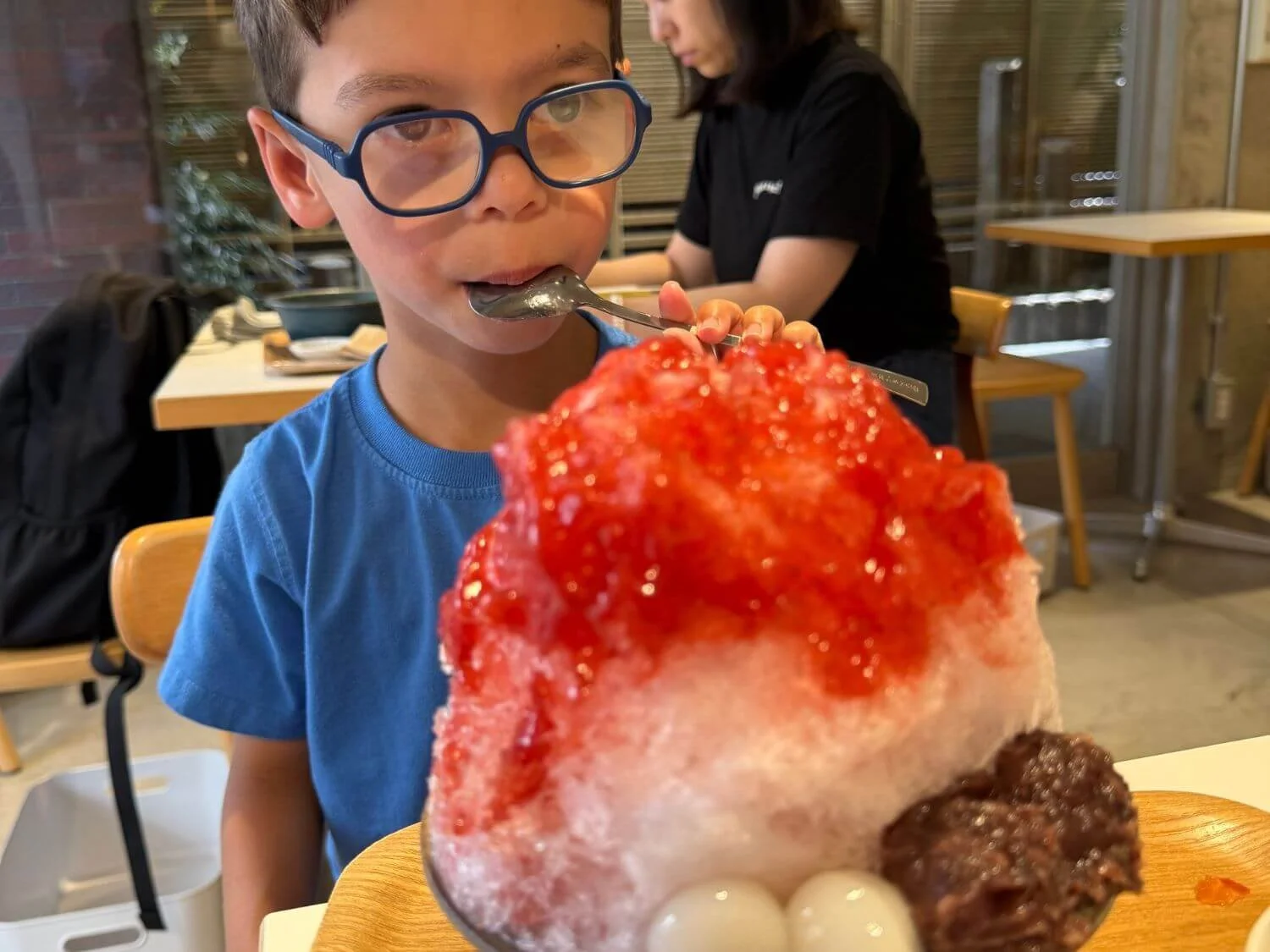 kakigori (Japanese shaved ice) with strawberry sauce and mochi