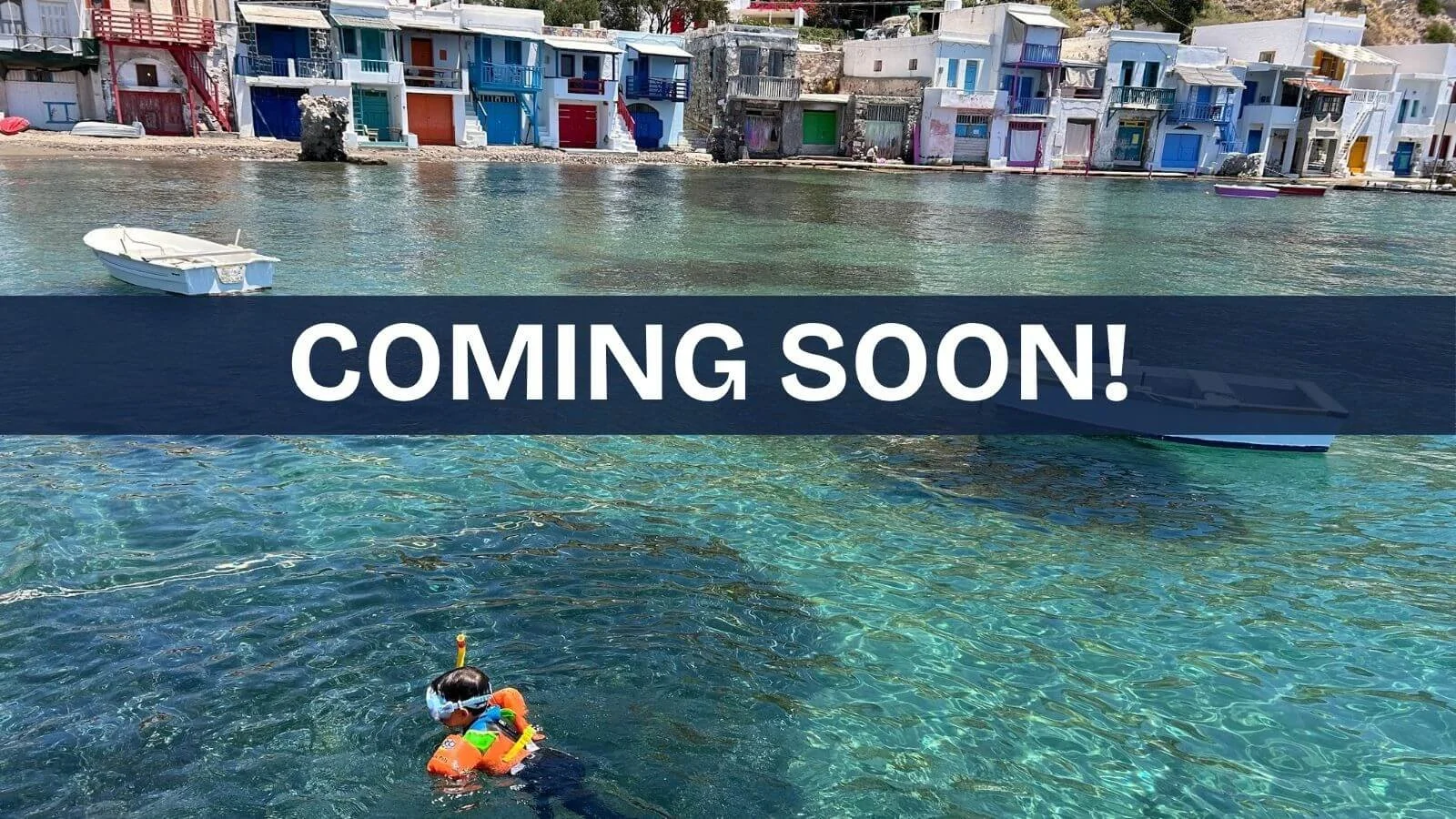 Child snorkeling in Milos, Greece