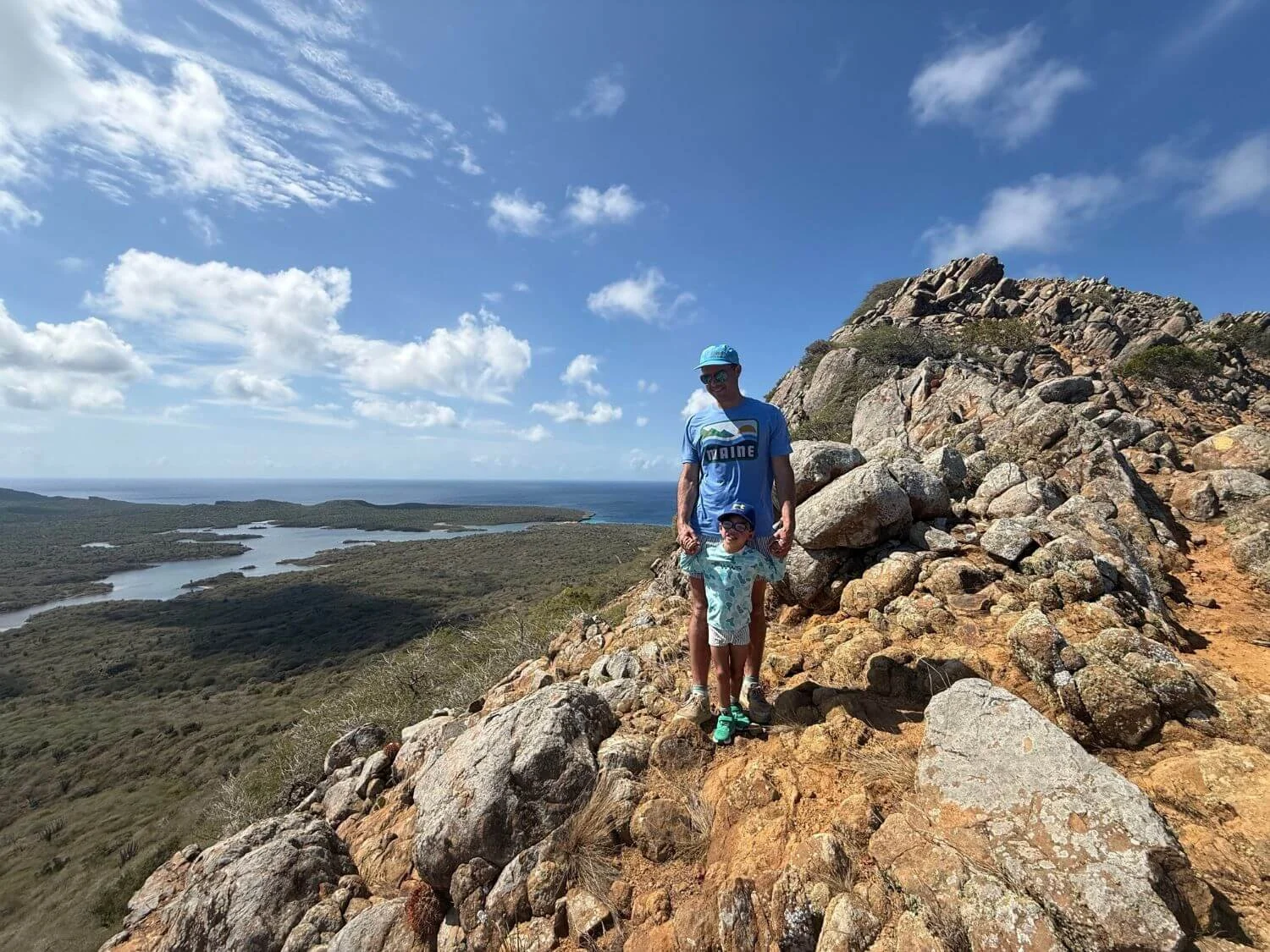 Father and son almost to the top of Mt. Brandaris in Washington-Slagbaai Bonaire.