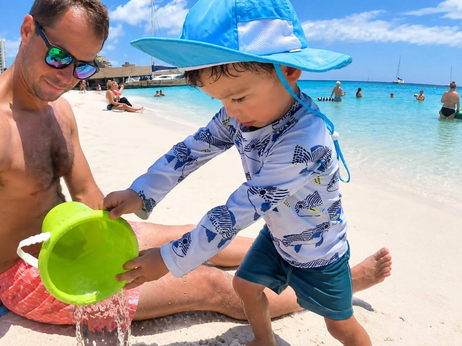 Jackson playing in the calm water on Palm Beach in Aruba.