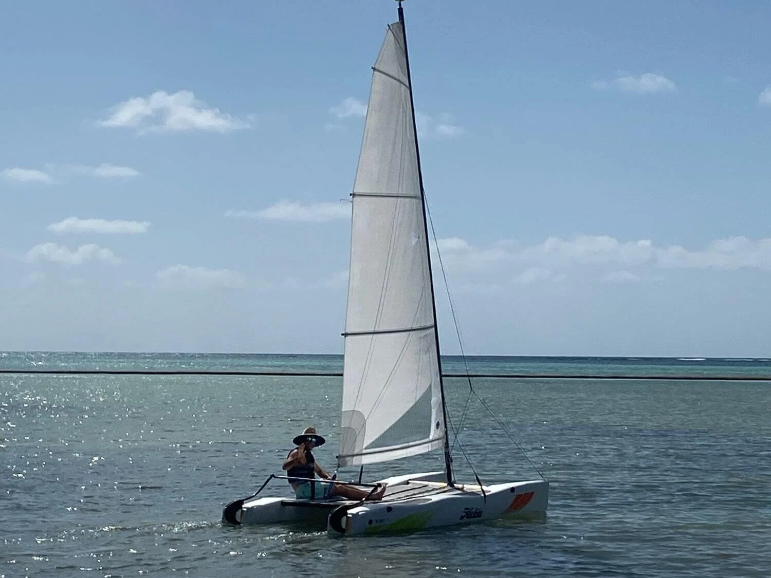 Man on a free water sports boat at the Hyatt Ziva Cap Cana in the Dominican Republic.