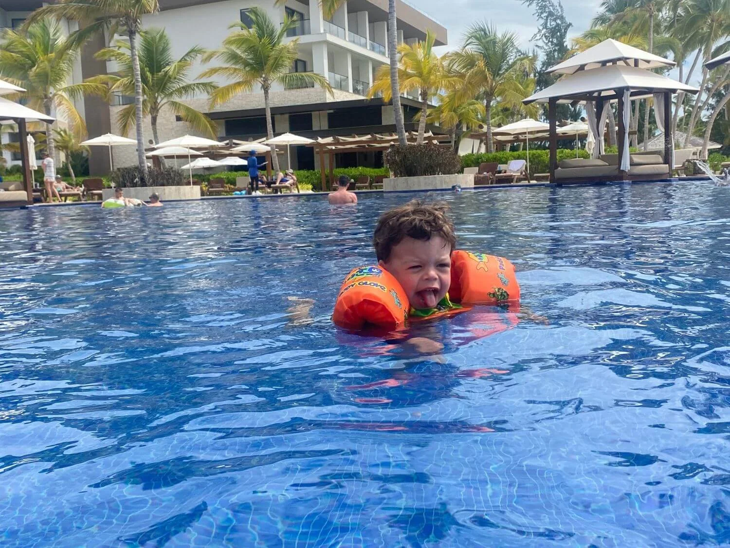Toddler swimming at the Hyatt Ziva Cap Cana in the Dominican Republic.