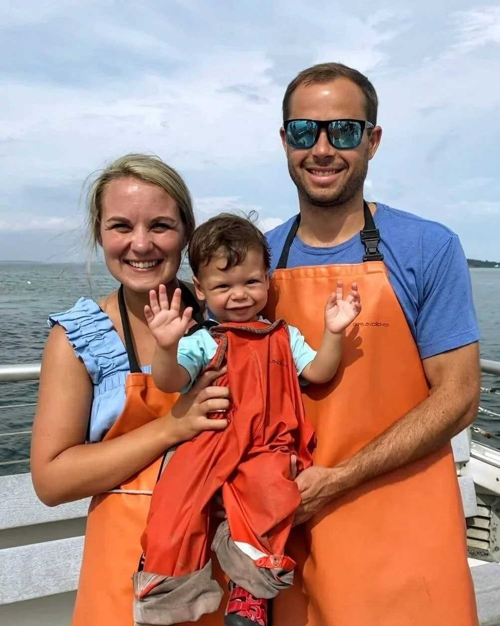 Family on boat tour for lobsters in Portland, Maine.
