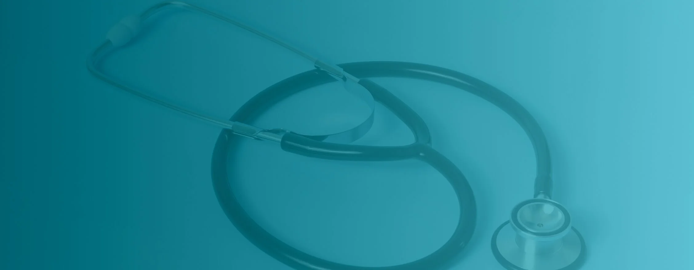 Stethoscope resting on a medical surface representing healthcare careers.