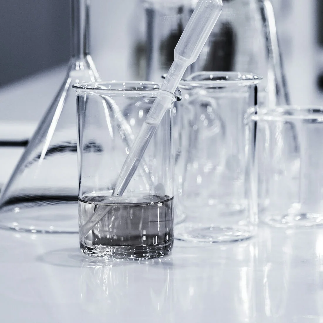 Laboratory glassware and equipment used in healthcare and medical research.