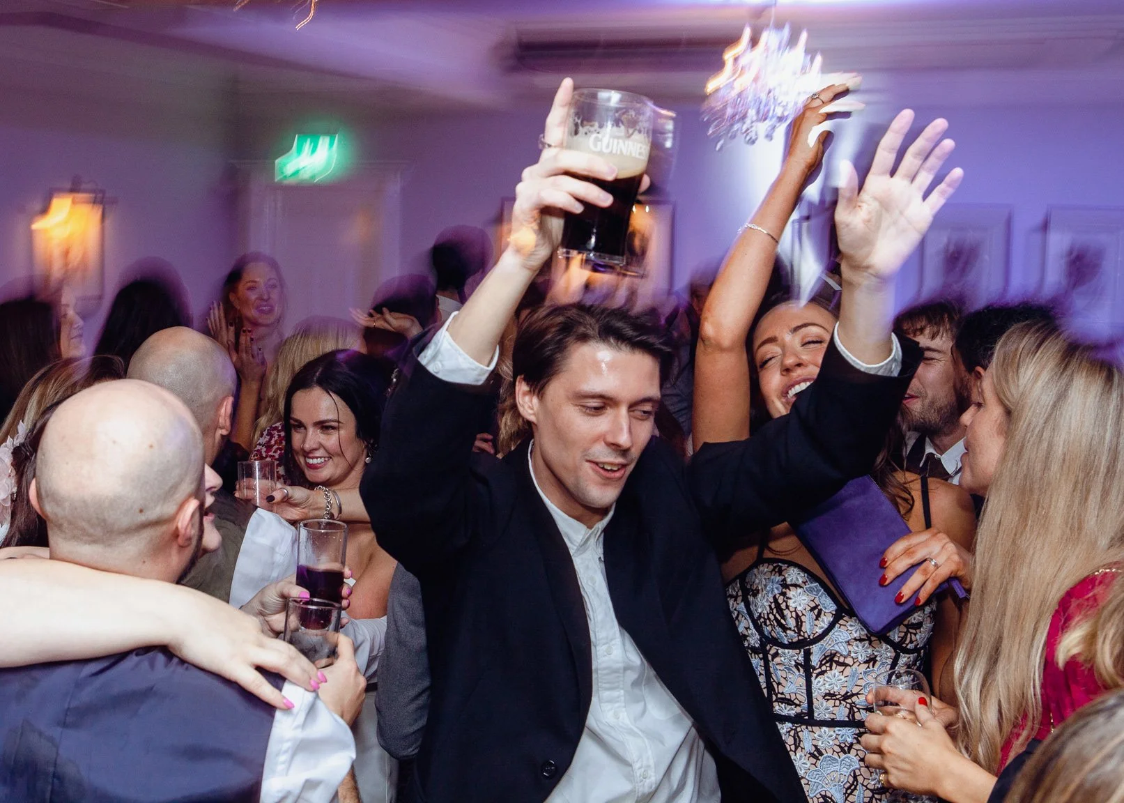 Guests-celebrate-on-dance-floor-at-wedding.jpg