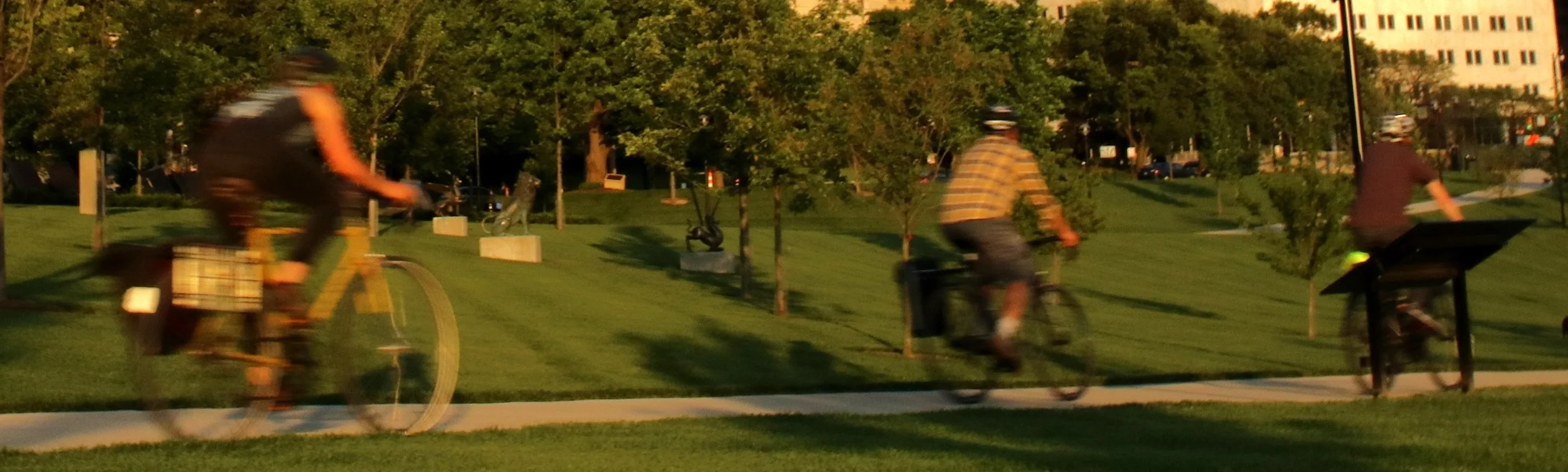 bikers on city bike path, motion blur