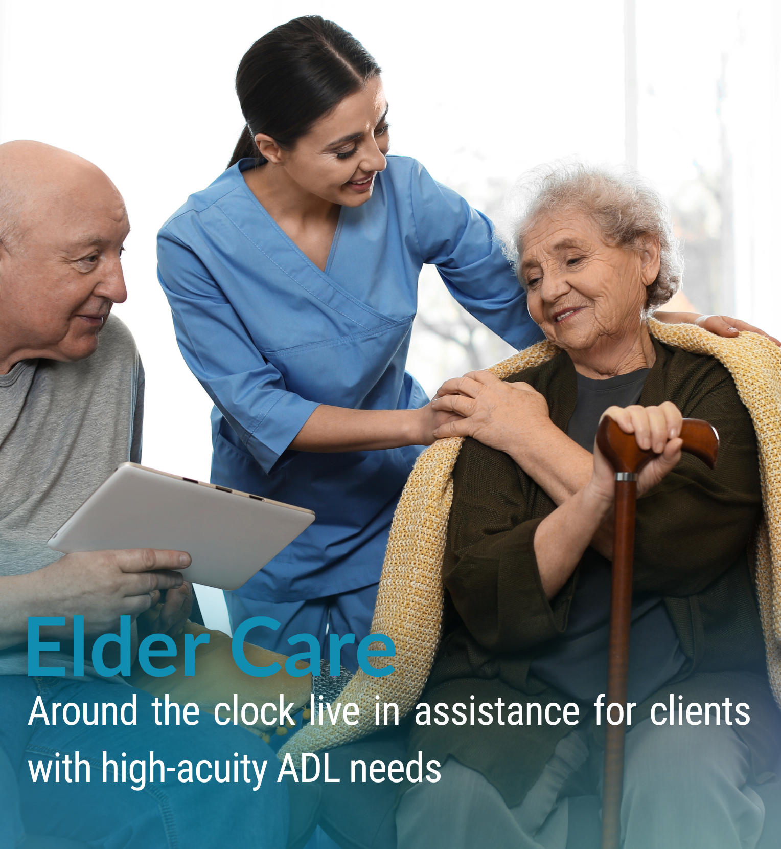 A caregiver with dark hair assists an elderly woman with gray hair holding a walking stick, while another elderly man looks on. All are smiling indoors with a bright window in the background.
