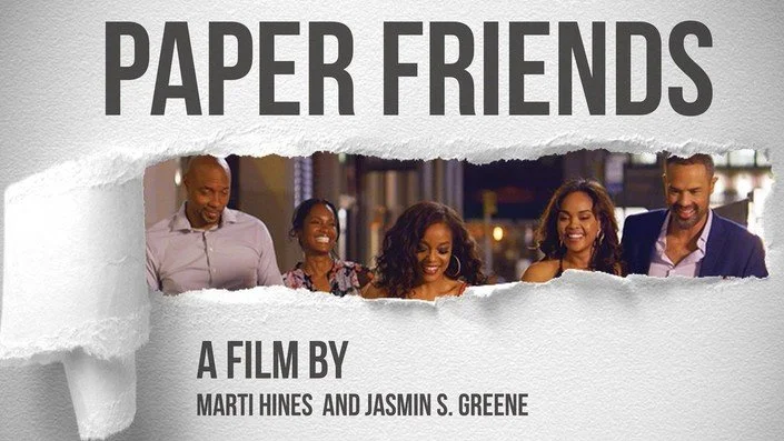 Poster for the film "Paper Friends" by Marti Hines and Jasmin S. Greene, featuring five smiling people in a modern indoor setting.