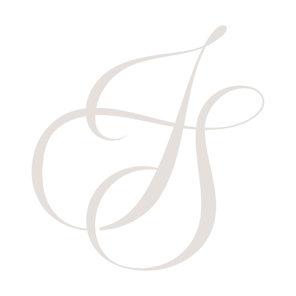 Cursive monogram initials, J S, logo for Jennifer Seery Editorial.