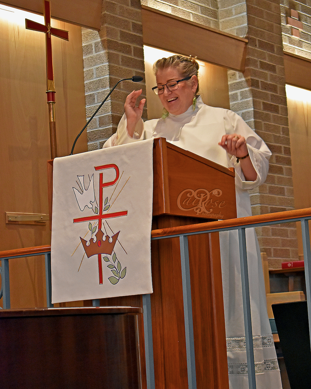 Pastor Julie Smiling Giving Introduction, credited.png