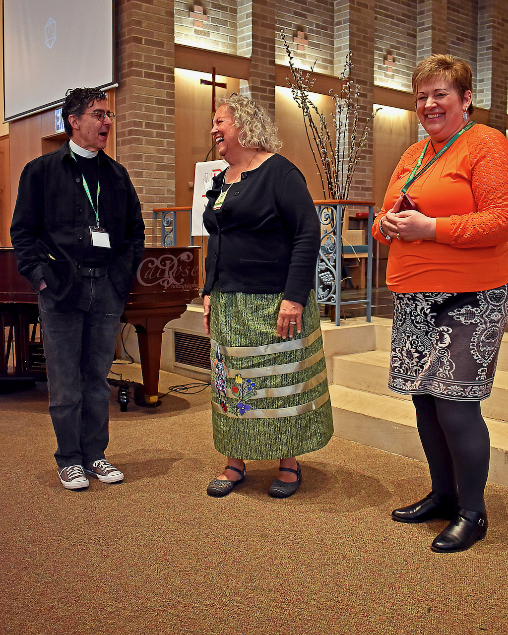 Robin Talking with Deacon David and Event CoChair, credited.png