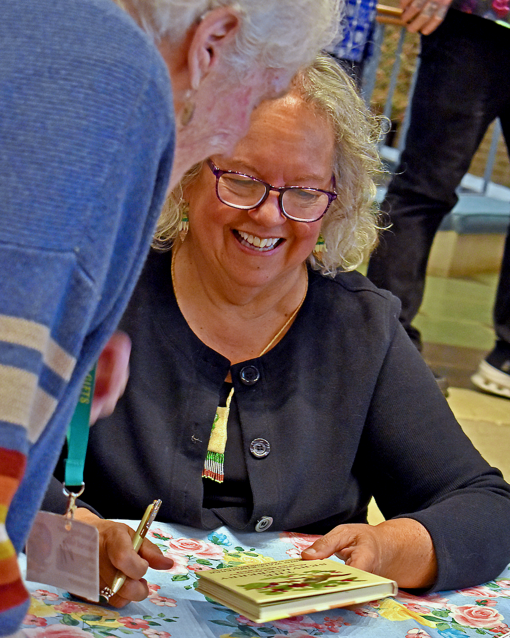 Robin Wall Kimmerer, Smiling after Signing Book
