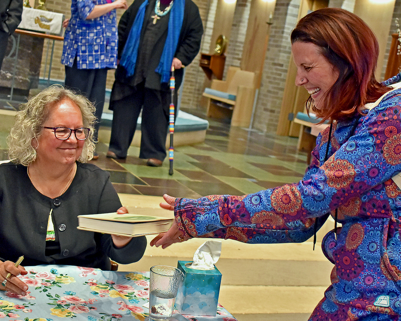 A Very Happy Fan Receiving Signed Book