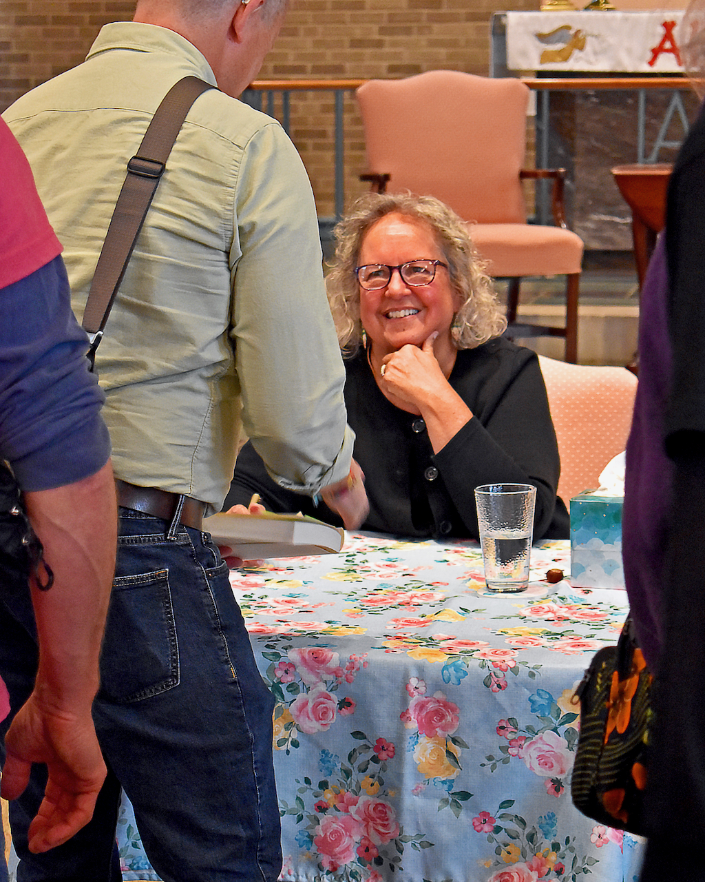 Robin Wall Kimmerer, Smiling, Signing