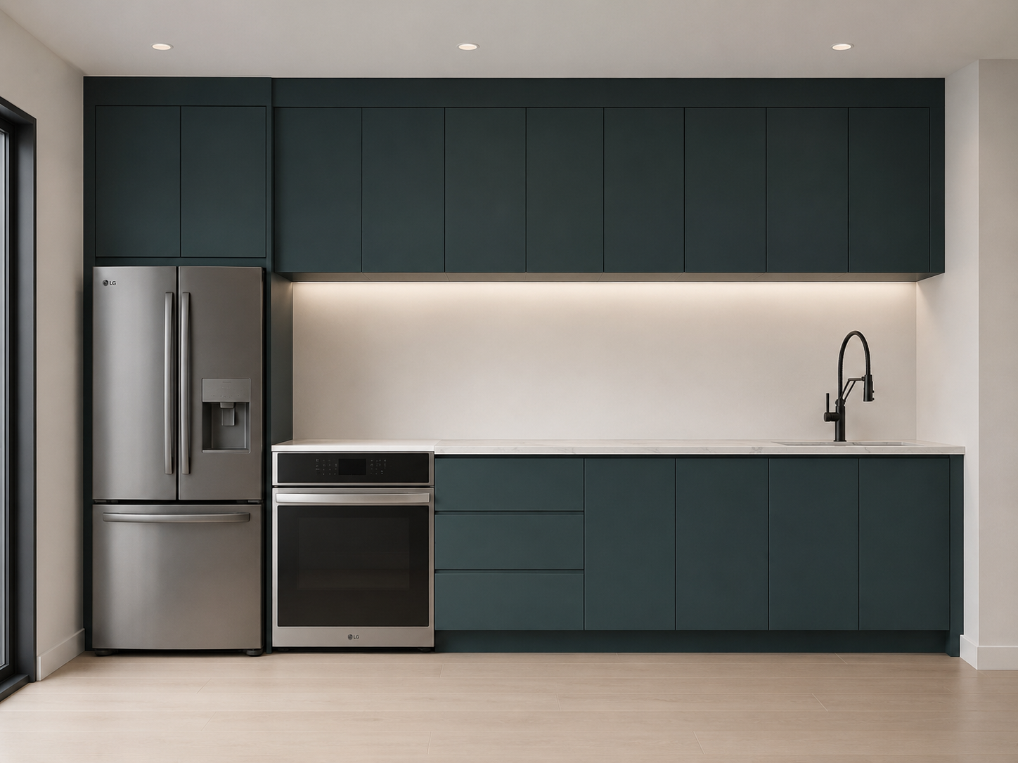 Modern kitchen with dark teal cabinets, stainless steel refrigerator, oven, black faucet, and white countertop.