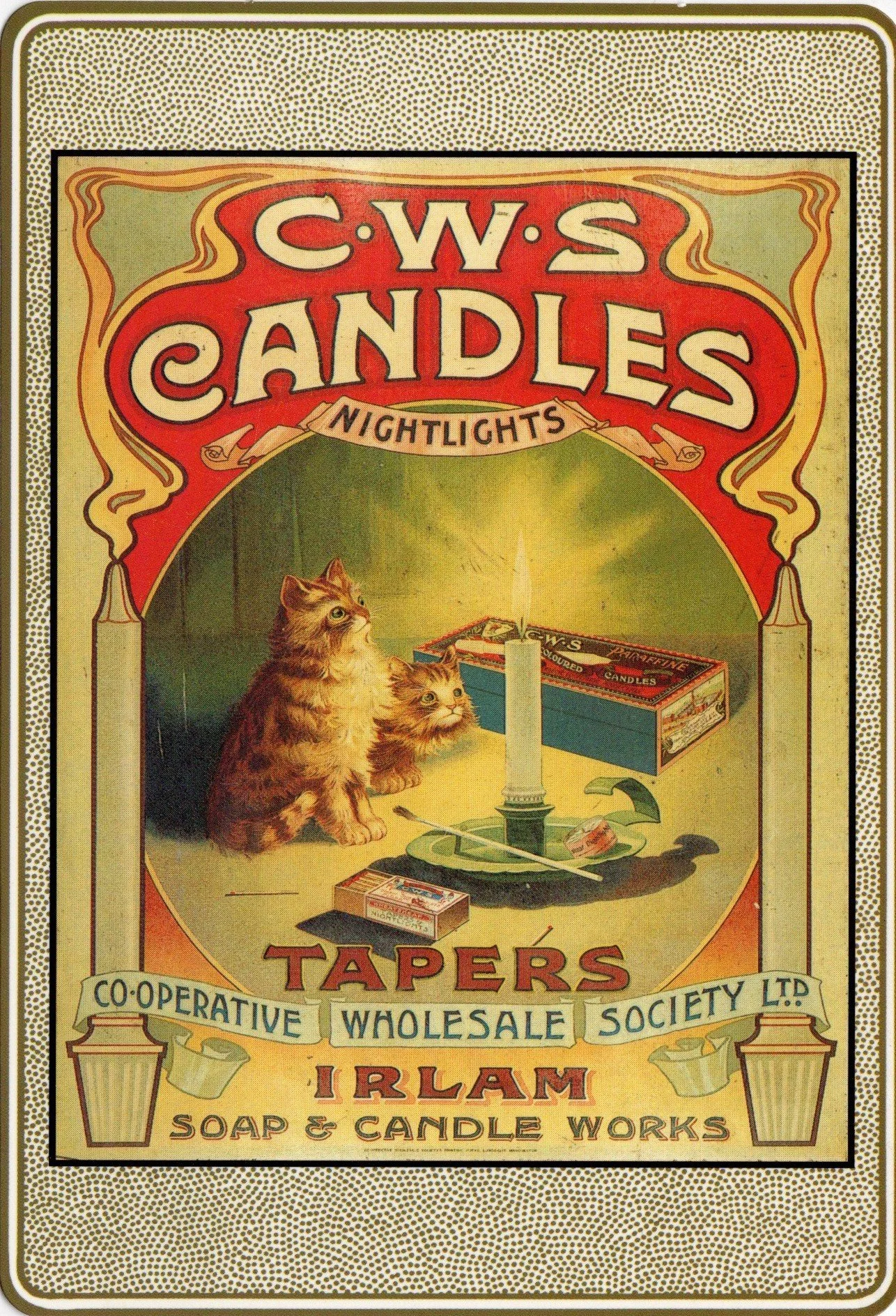 Vintage advertisement for C.W.S. Candles and Tapers by Irlam Soap & Candle Works, featuring two cats sitting near a lit candle and matchbox.