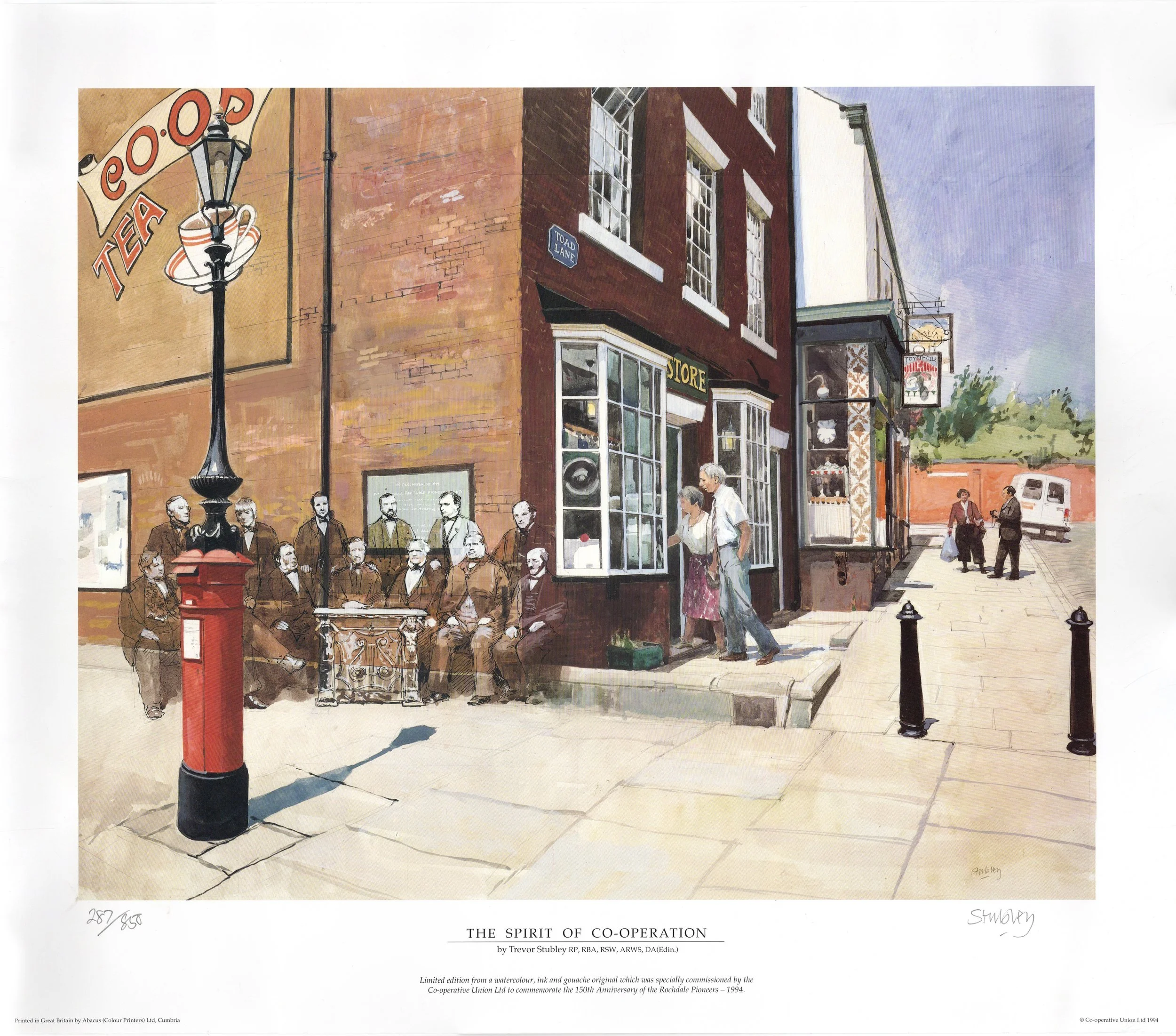 Watercolor painting titled 'The Spirit of Co-operation' shows a street corner with a group of people, including a man and woman walking, two people near the store, and a few in the distance. There is a large building, a street lamp, a red fire hydran