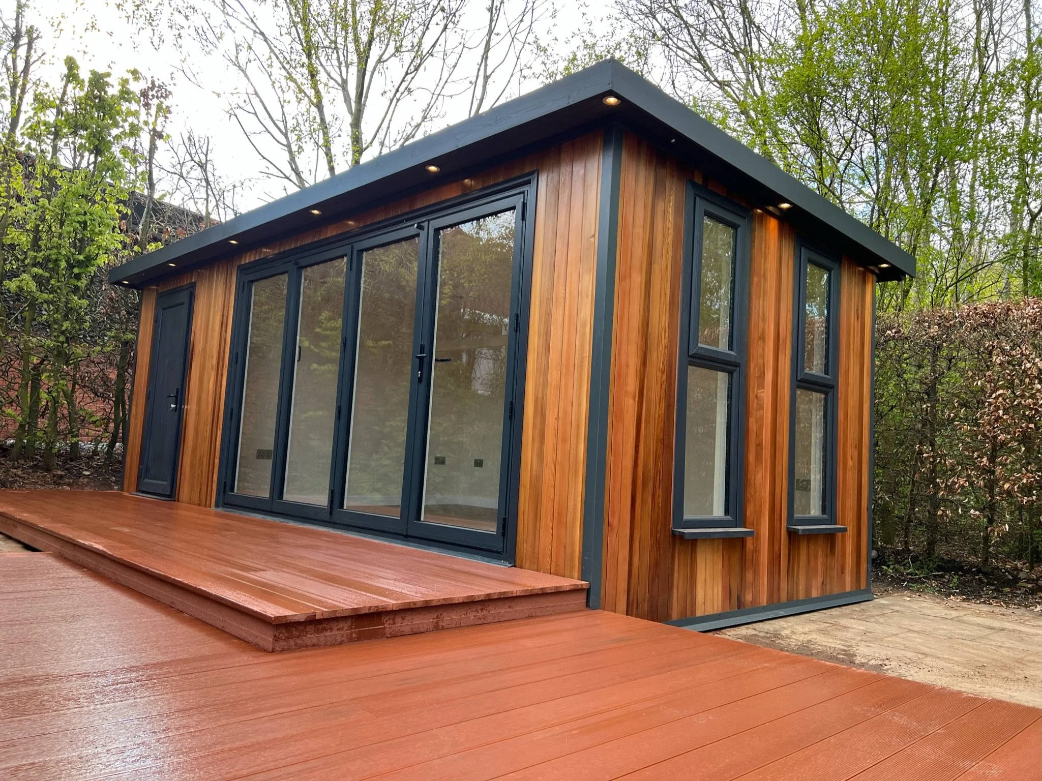Oranssi technician working on a roof project