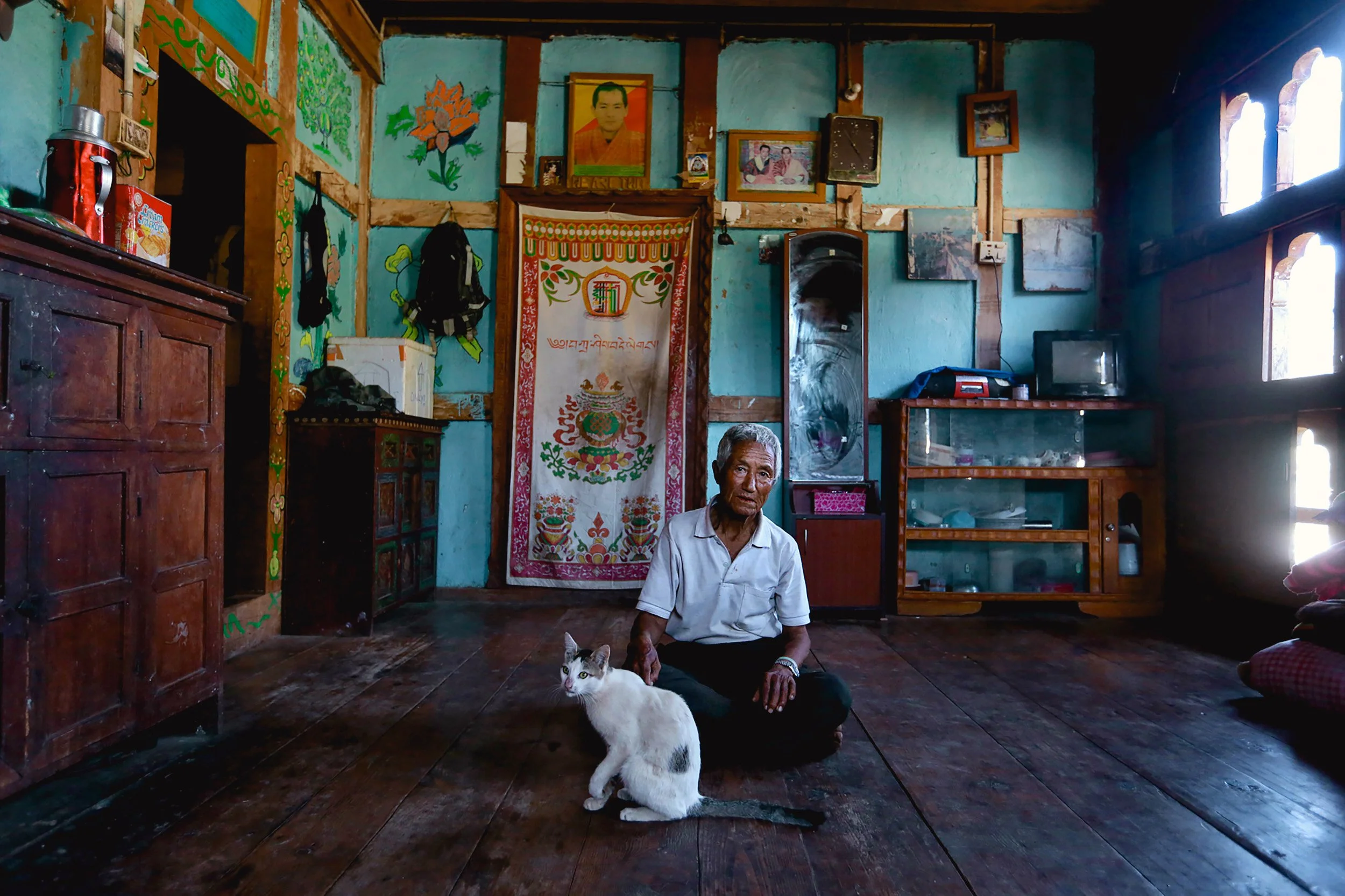 Farmer and cat, Bhutan.