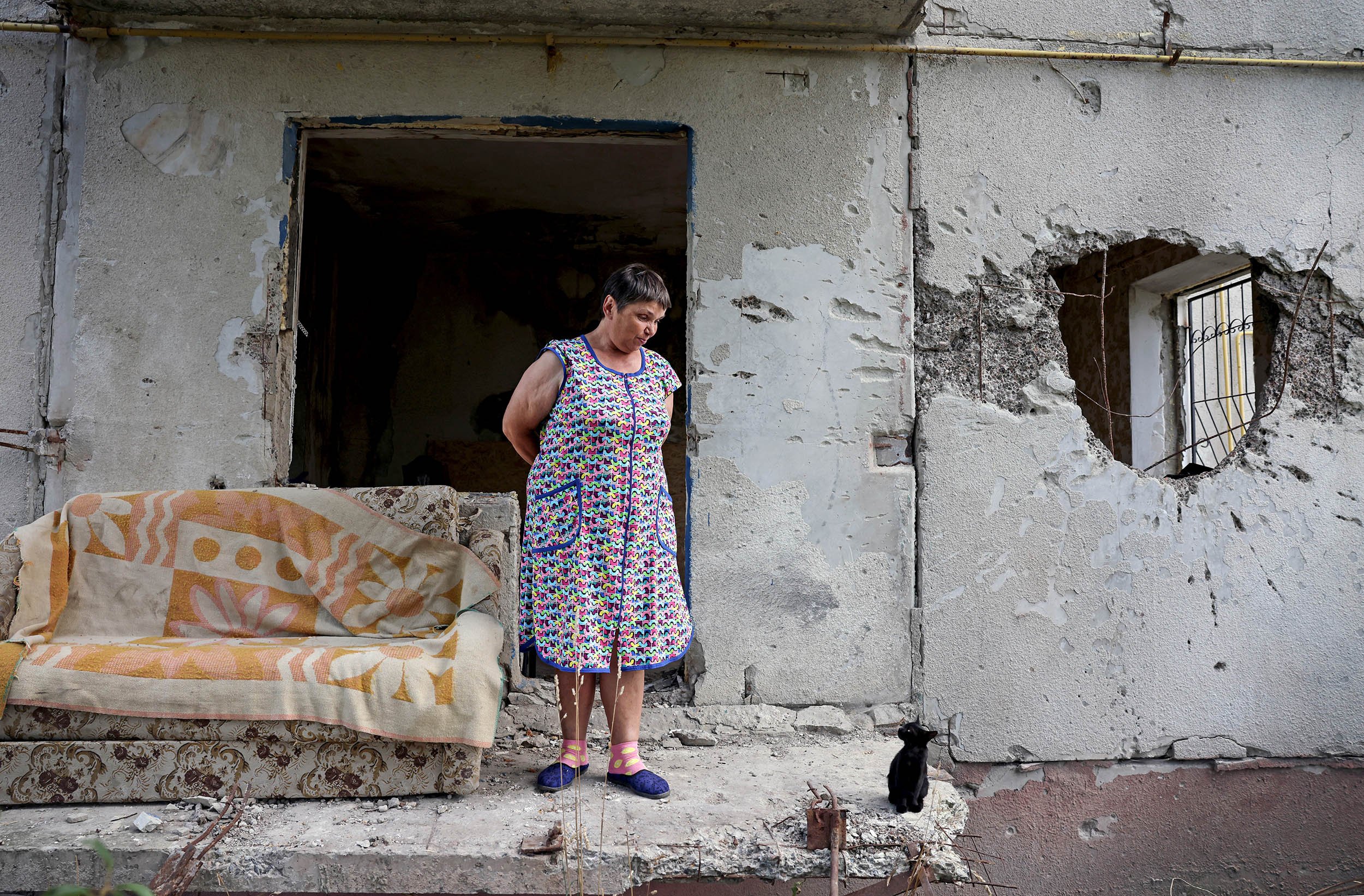Woman and cat, Ukraine.