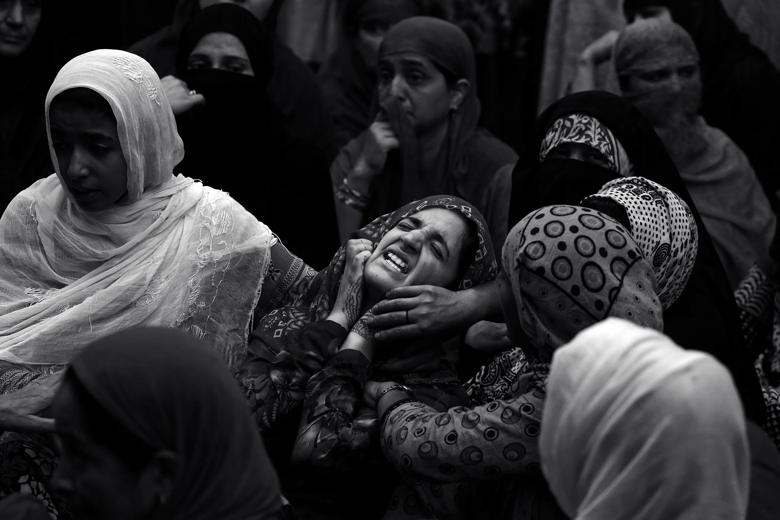Grieving widow, Kashmir.