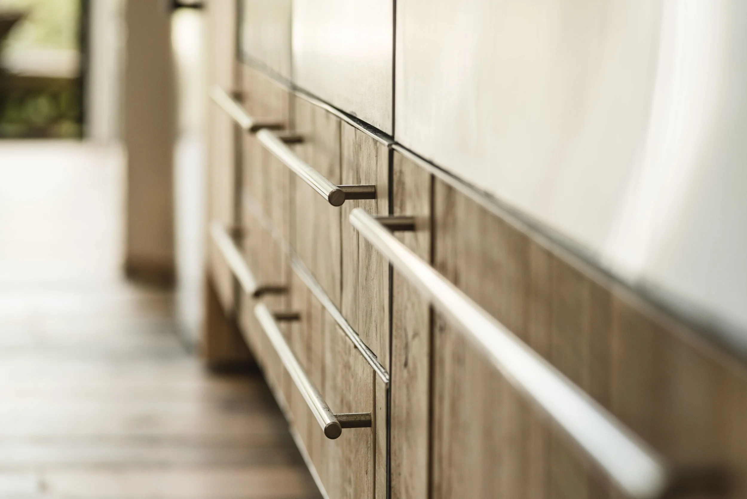 Reclaimed wooden and stainless steel kitchen door fronts