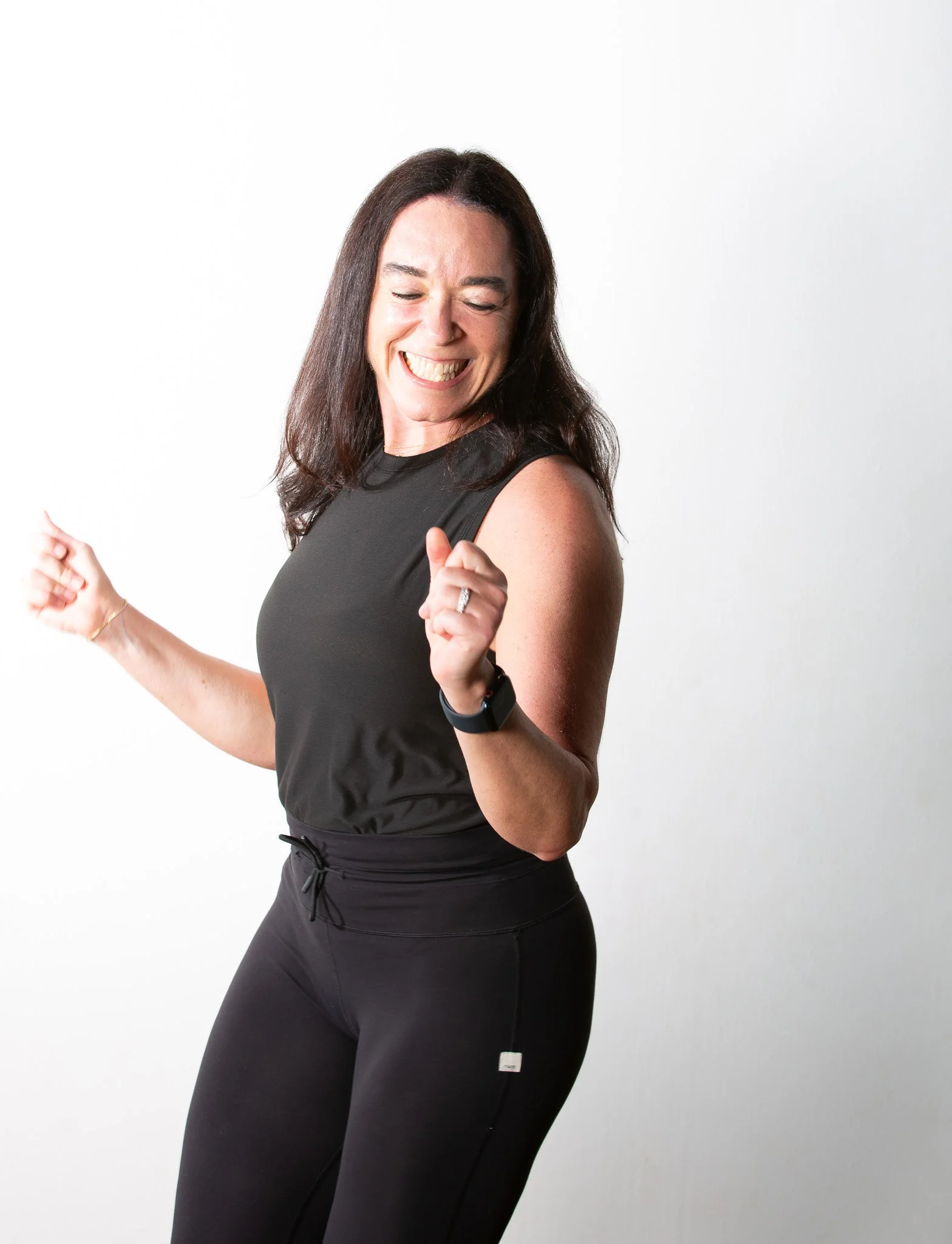 Sukha Yoga Power Teacher Dr Esther dancing and smiling 