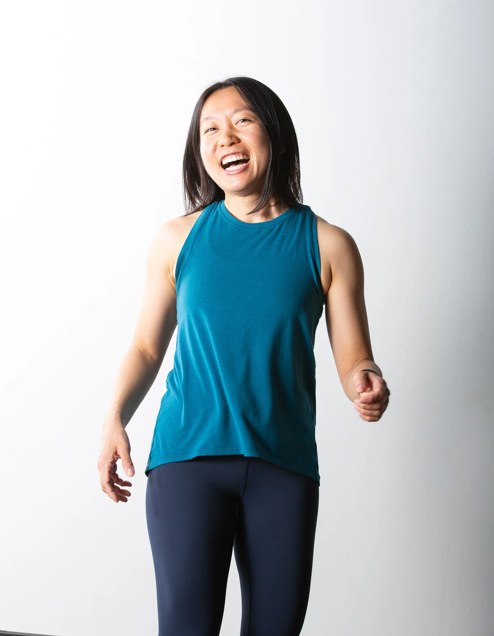 Sukha Yoga Austin Power Yoga Teacher Jen Wu smiling in studio image