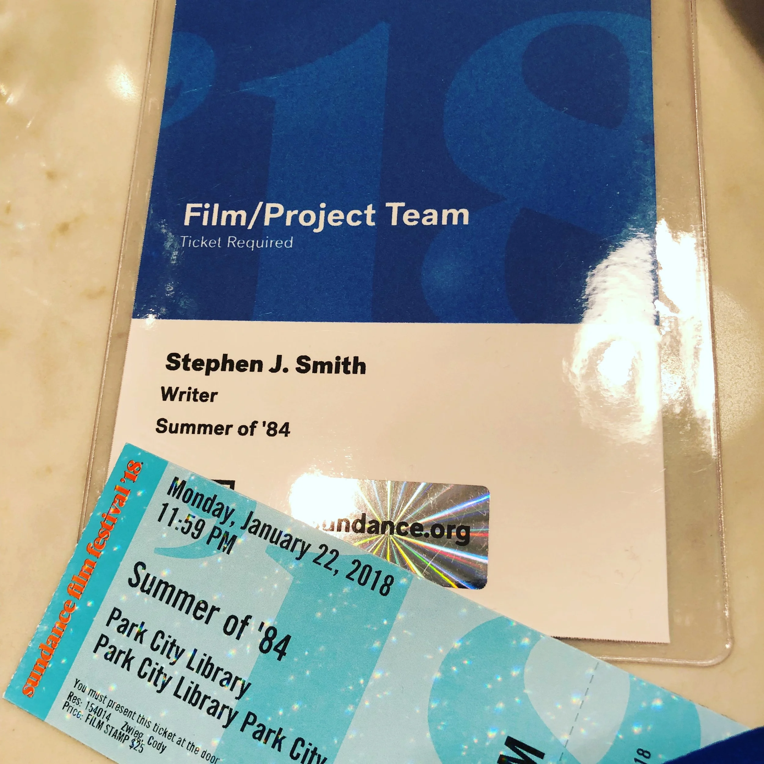 Film project team badge with name Stephen J. Smith, a writer from the movie Summer of 84, and a Sundance Film Festival ticket for Monday, January 22, 2018, at 11:59 PM for the Park City Library Park City.