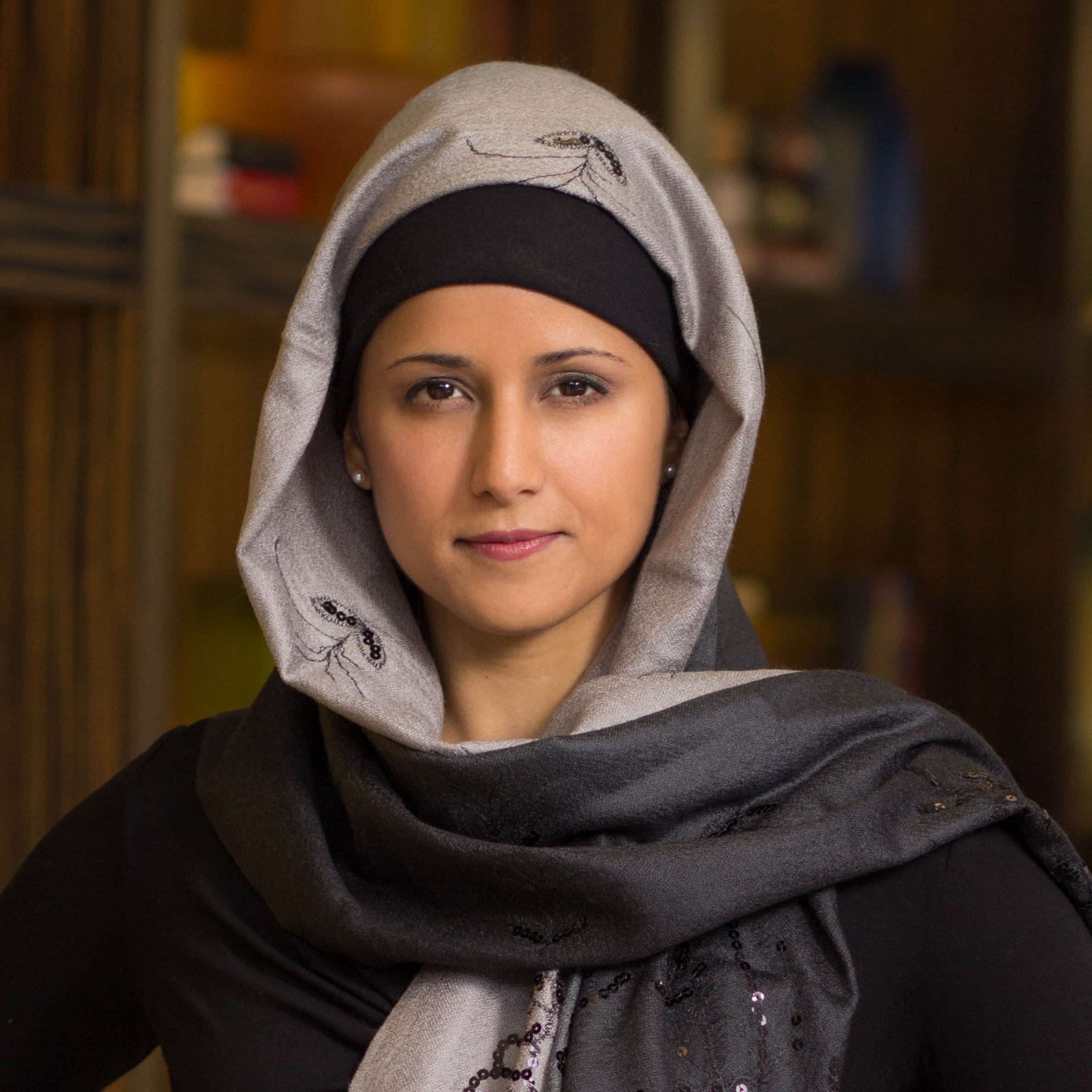 A headshot of Aisha Ahmad, the lab founder of Secure Futures Lab.