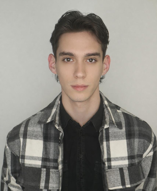 A headshot of Isaac Joseph Szego, Undergraduate Research Fellow.