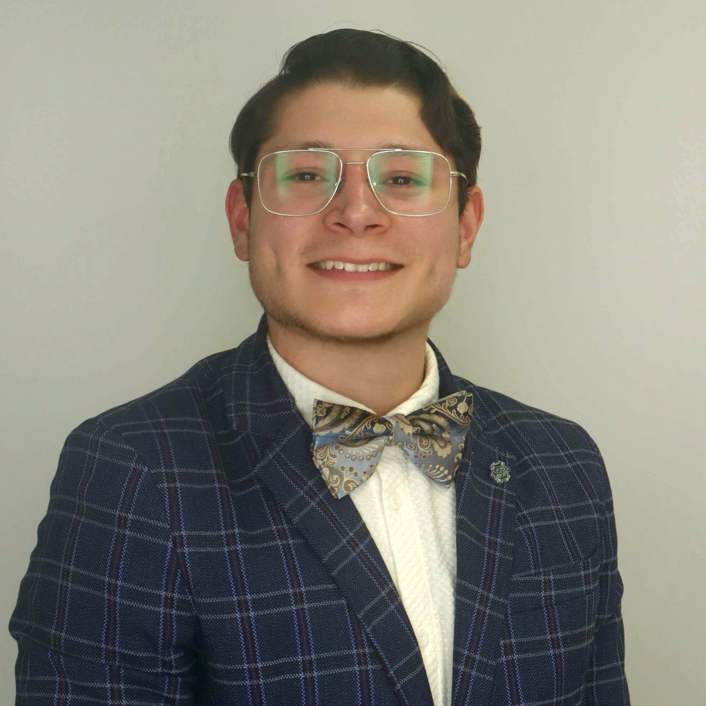 A headshot of Alan Dominguez Medina, Undergraduate Research Fellow.
