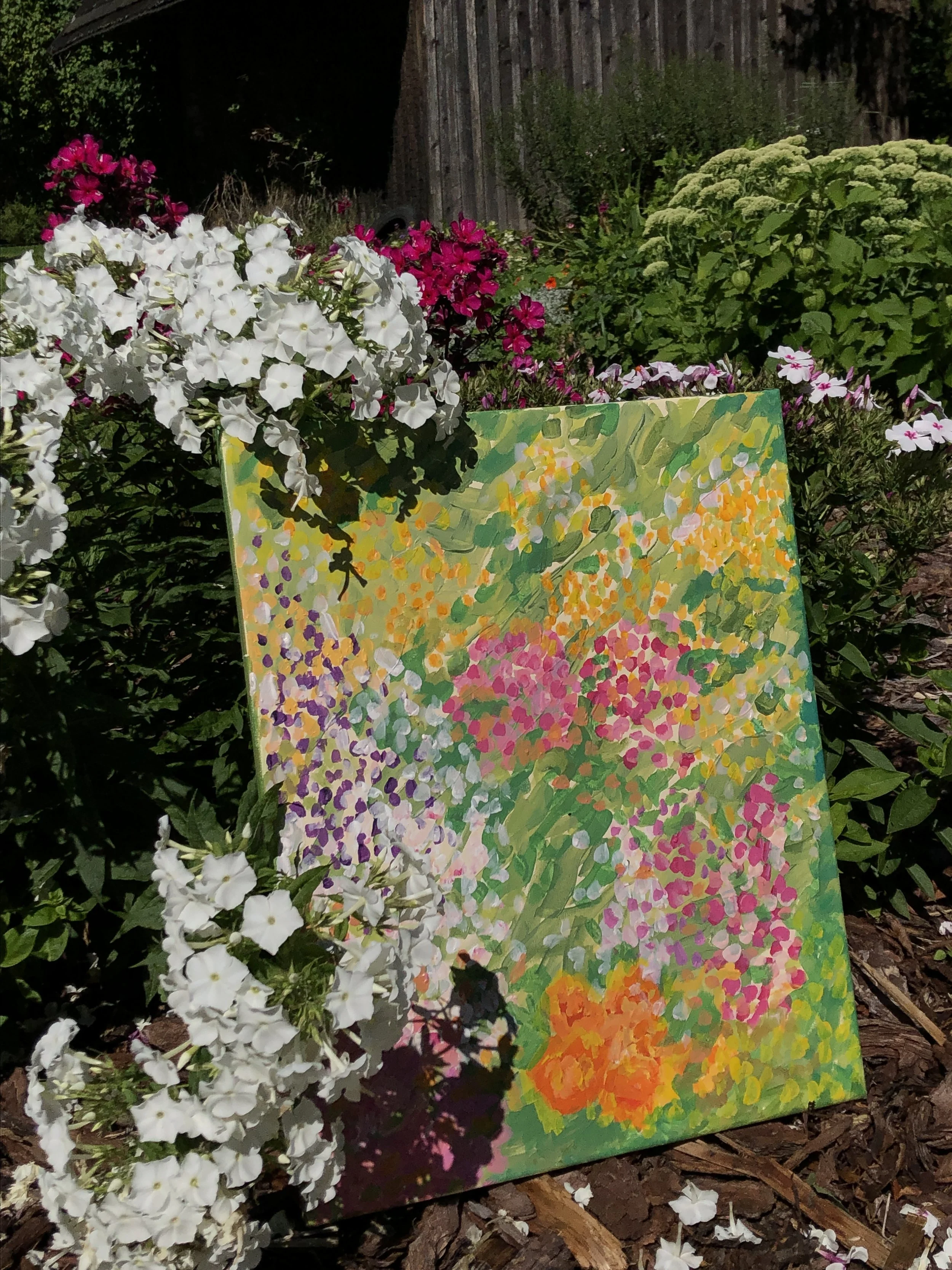Painted flowers in a flowerbed
