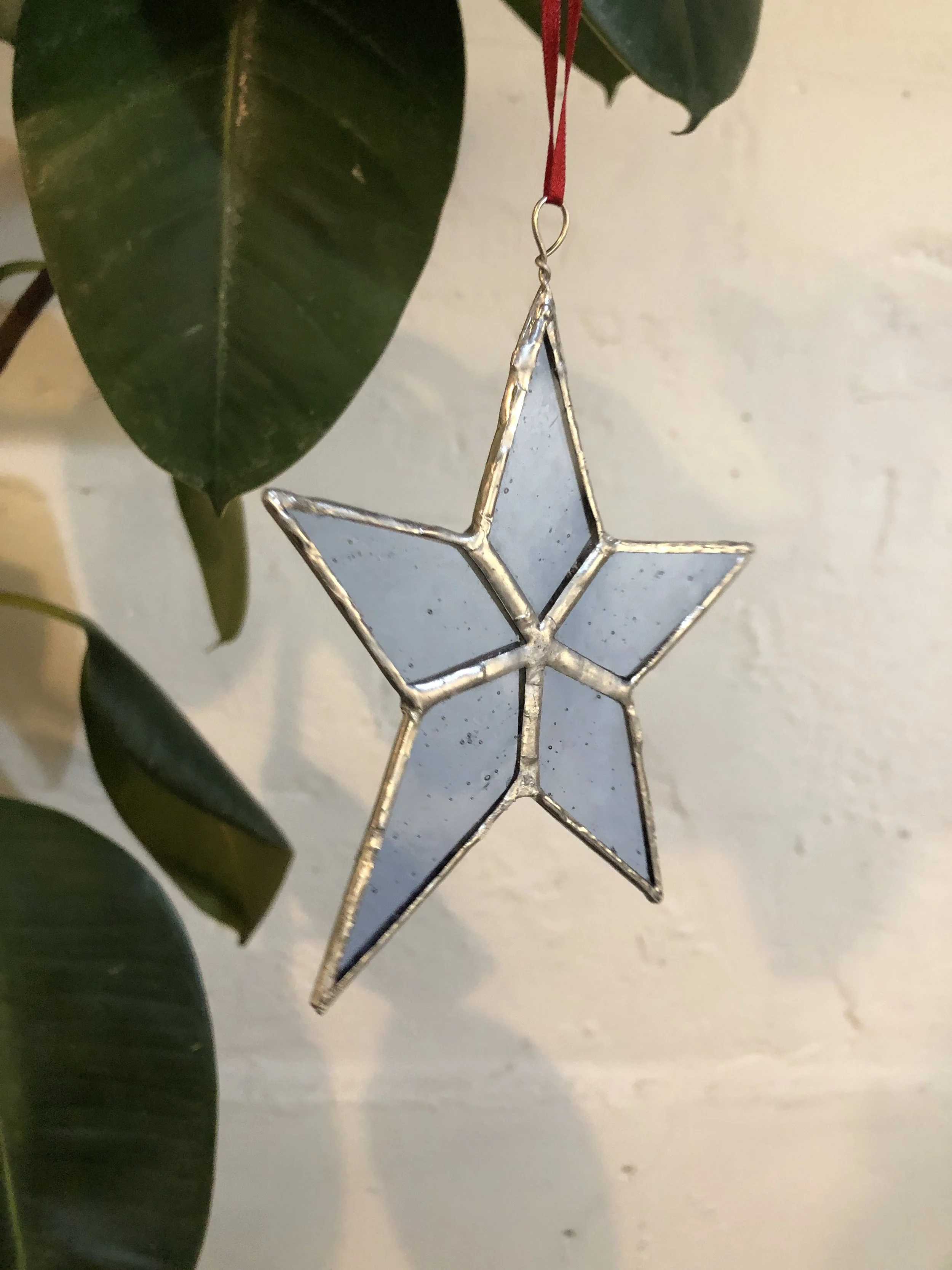 light blue stained glass star