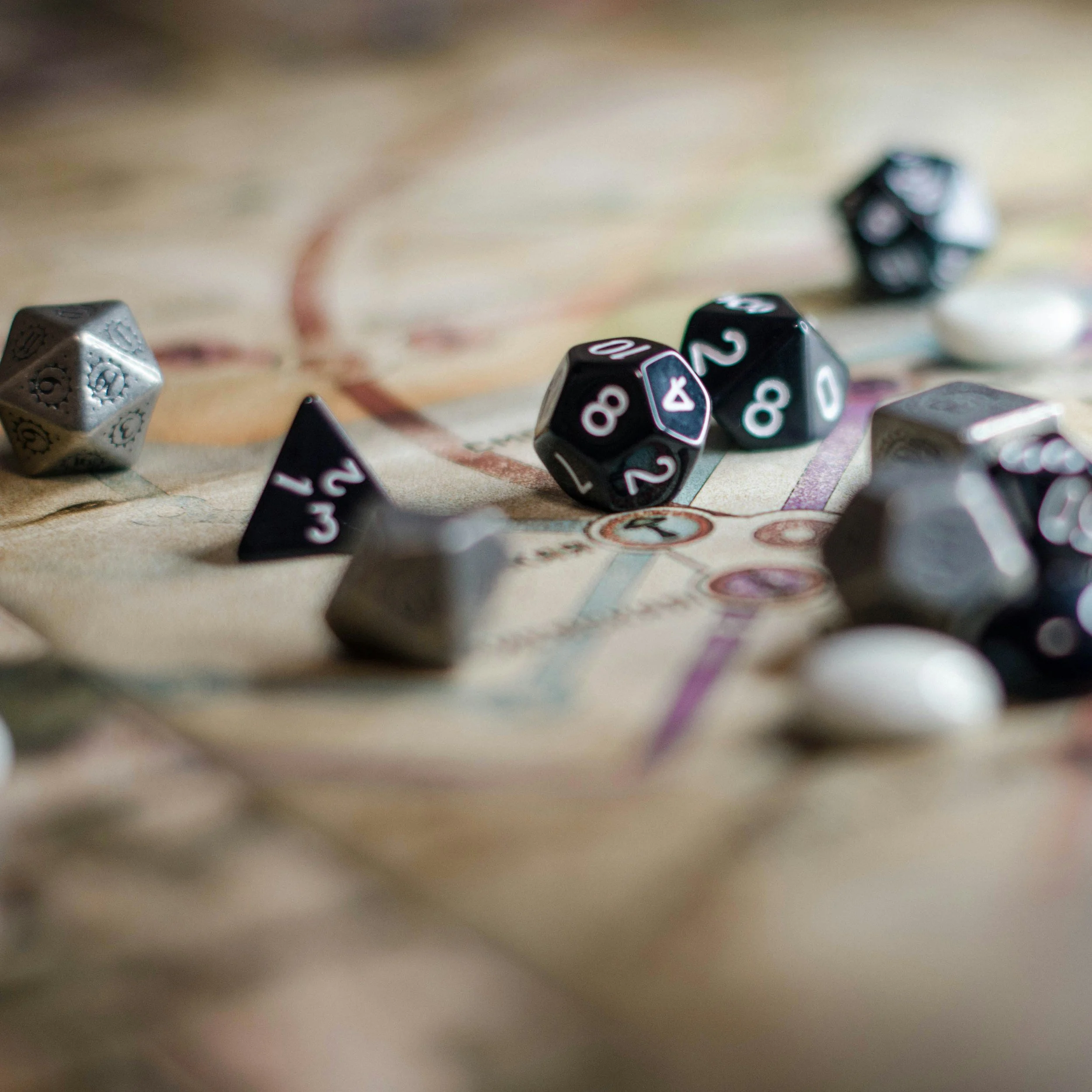 Dice on a map. tabletop role playing game. TTRPG. D&D, past life story, past lives, reincarnation