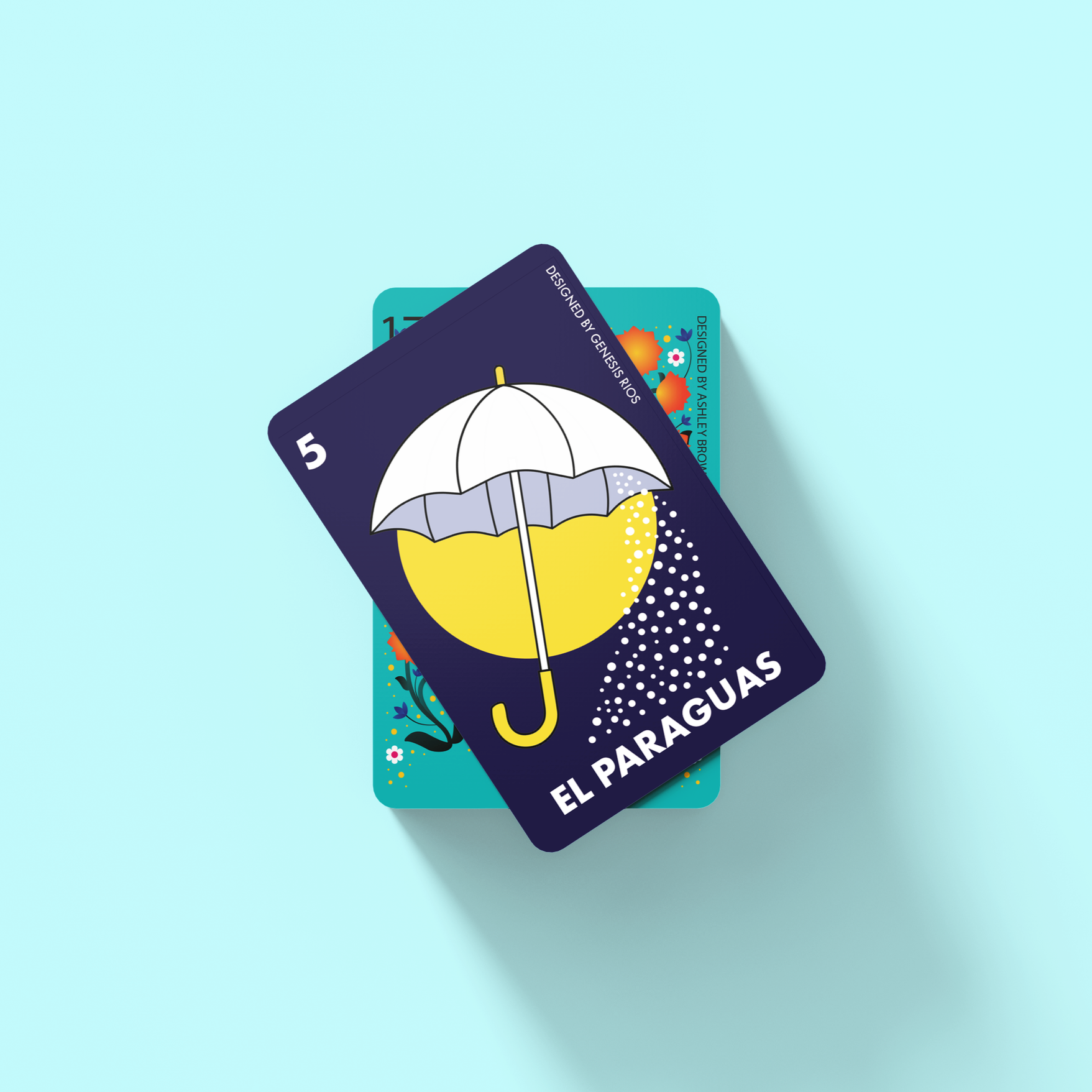 Card featuring an umbrella over a yellow circle, with text 'El Paraguas'.