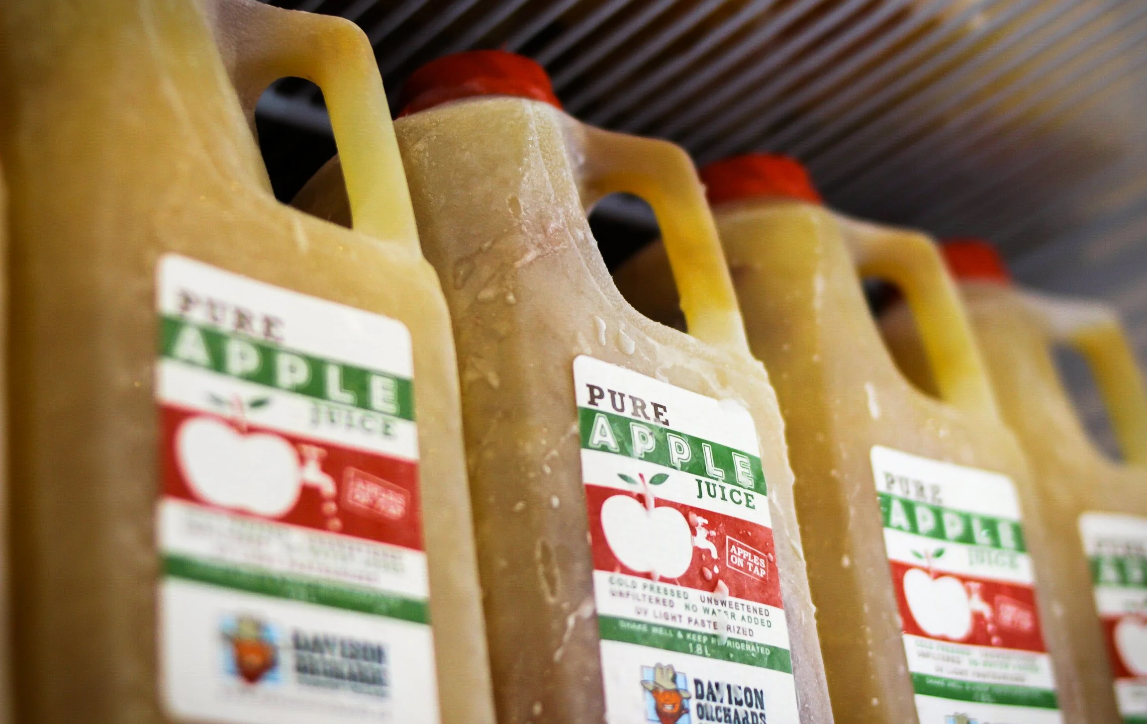 Frozen bottles of cold pressed apple juice from Davison Orchards in Vernon BC, freezes and thaws perfectly