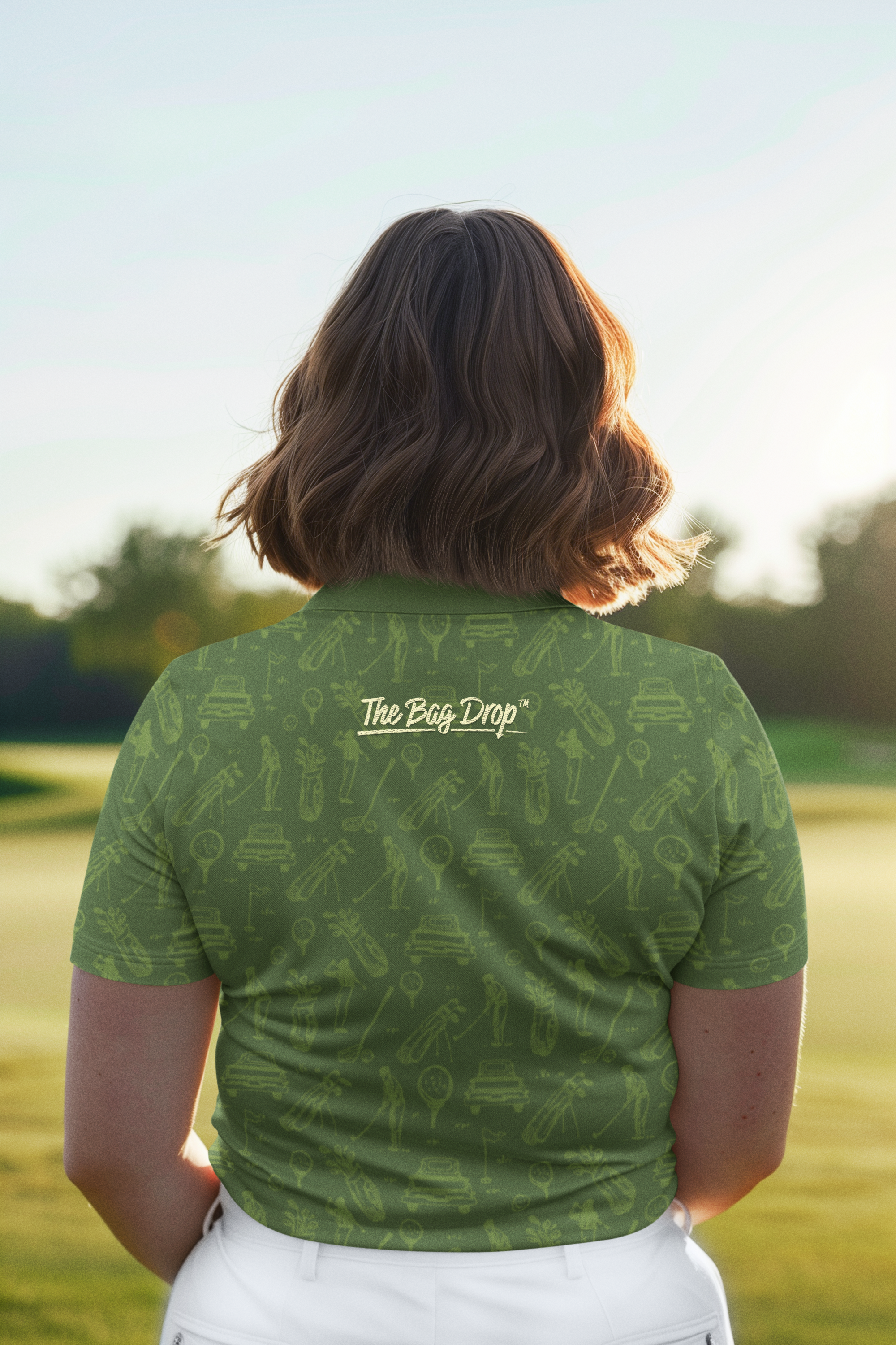 back-view-polo-shirt-mockup-featuring-a-woman-standing-on-a-golf-course-m50890.png