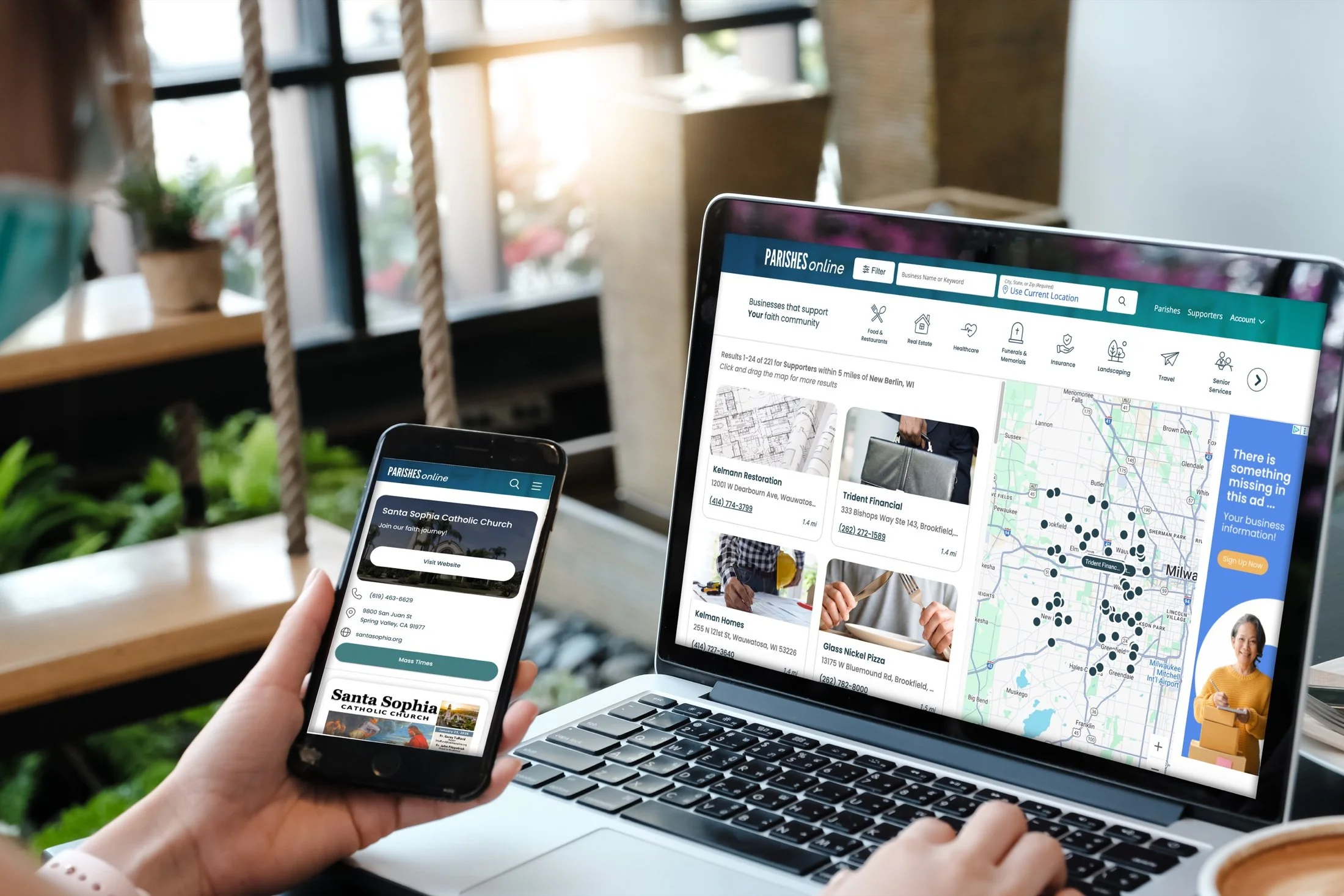 The redesigned Parishes Online on a laptop and a phone. The laptop shows supporting businesses near New Berlin, Wisconsin, with photo cards and a map. The phone shows a church listing with Visit Website and Mass Times buttons.