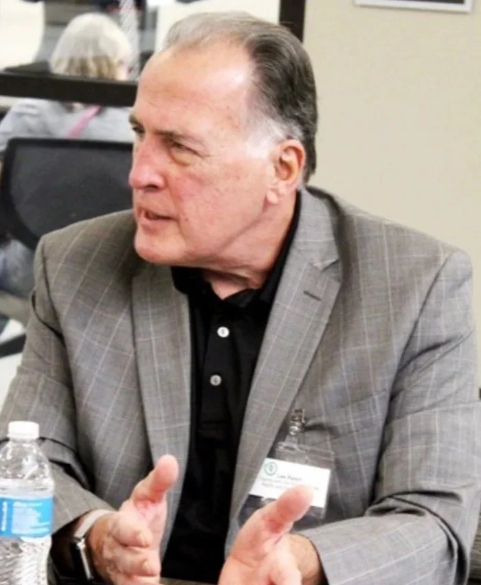 Addressing visitors at the Holmen Library Living Book Forum. 