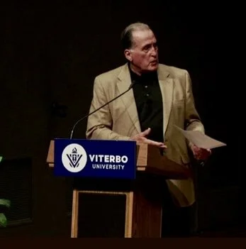 Lee Rasch addresses the audience at the 2025 Constitution Day event at Viterbo University.