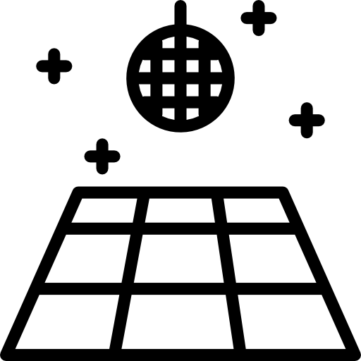 The image shows a person wearing black gloves and holding a clear spray bottle with a white nozzle, aiming the spray at a black surface.