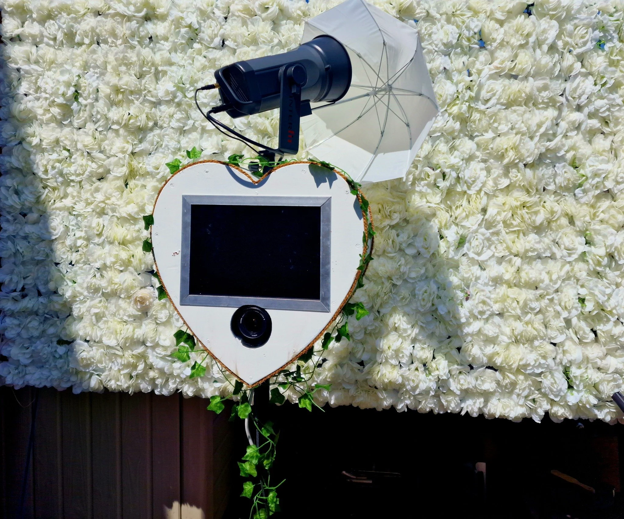 Heart Photo booth with flower wall