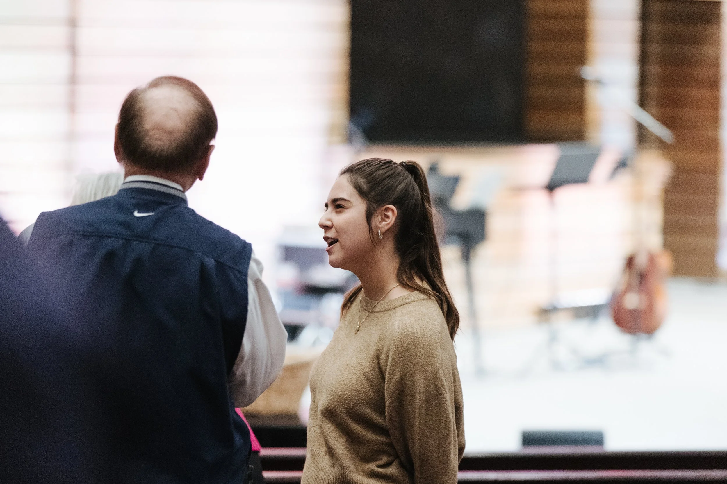 people chatting during the church service at Westover