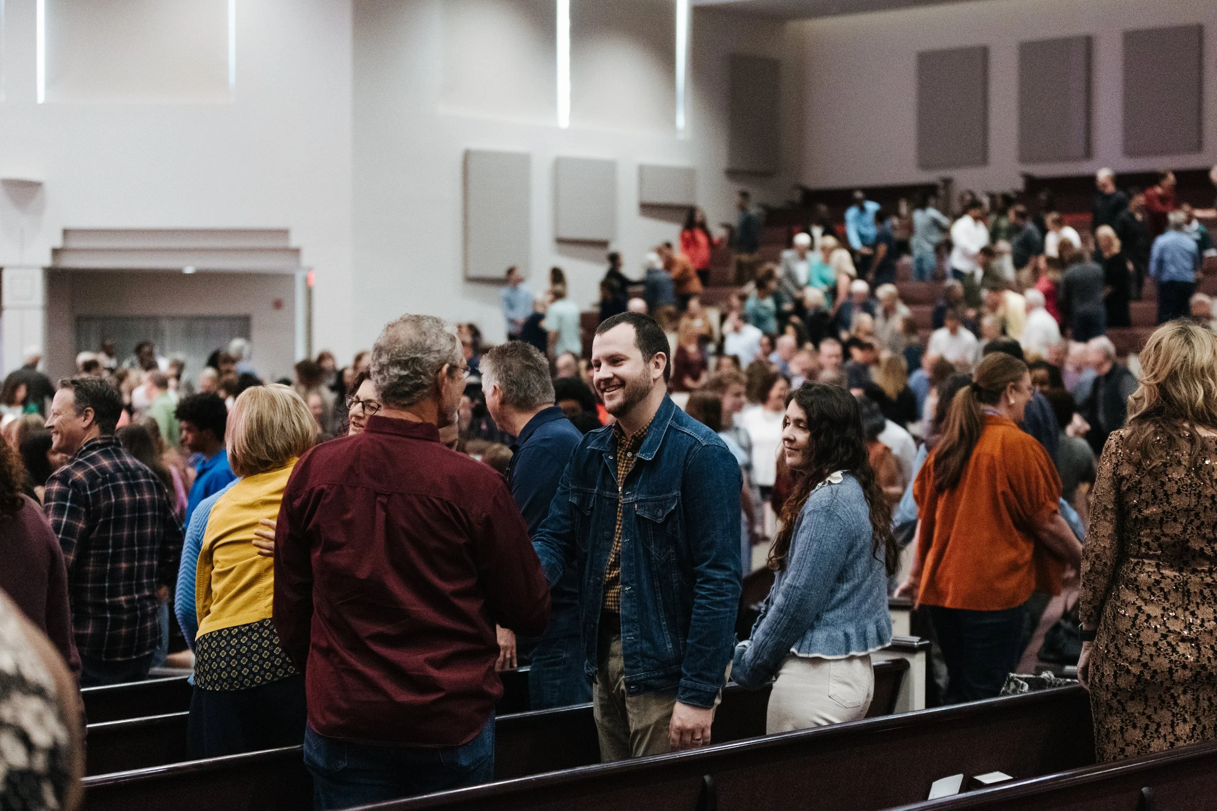 congregants greeting one another at Westover Hills Church of Christ in Austin, Texas