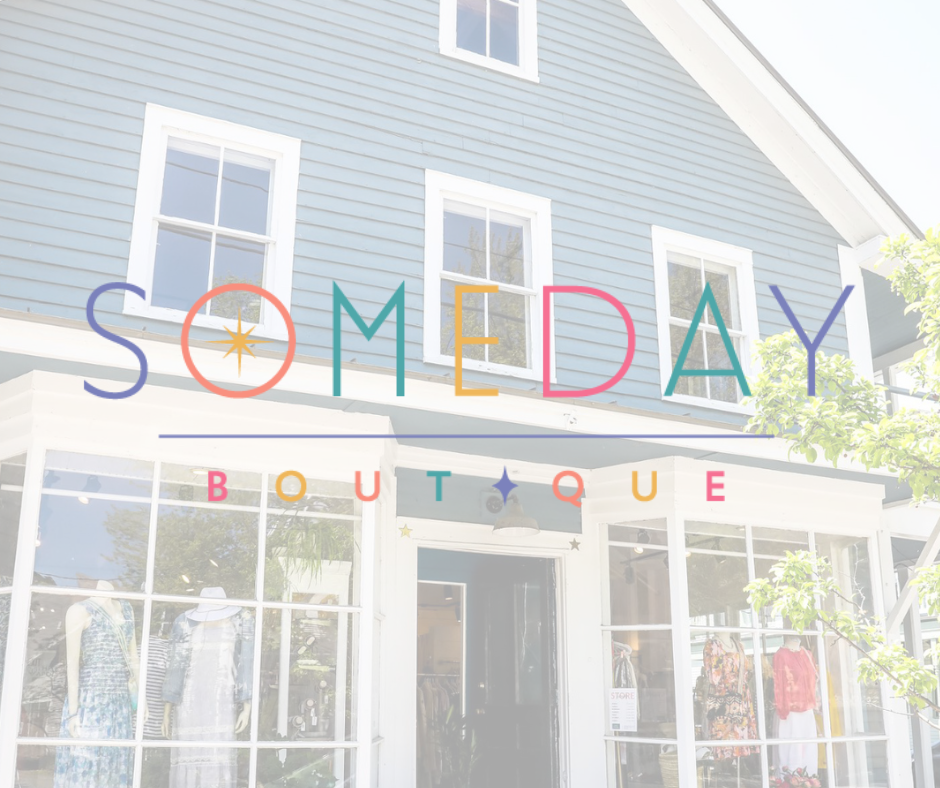 Facade of a boutique shop with large glass windows and a door, in front of a light blue house with white trim, with colorful "SOMEDAY BOUTIQUE" sign overlayed.