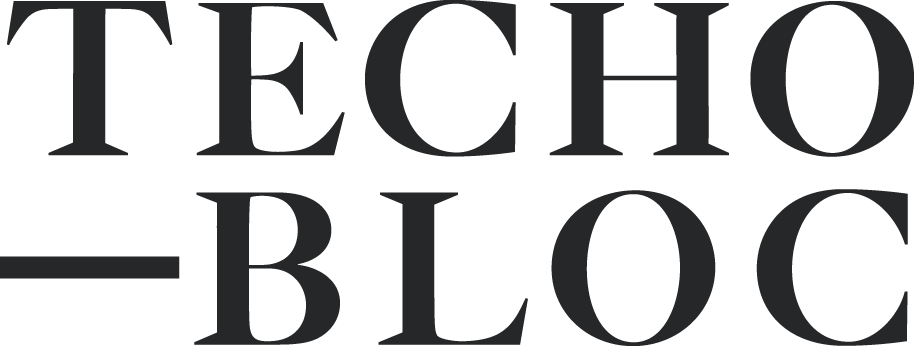 Black text on a transparent background that spells 'TECHOLOG BLOC' in a stylized font.
