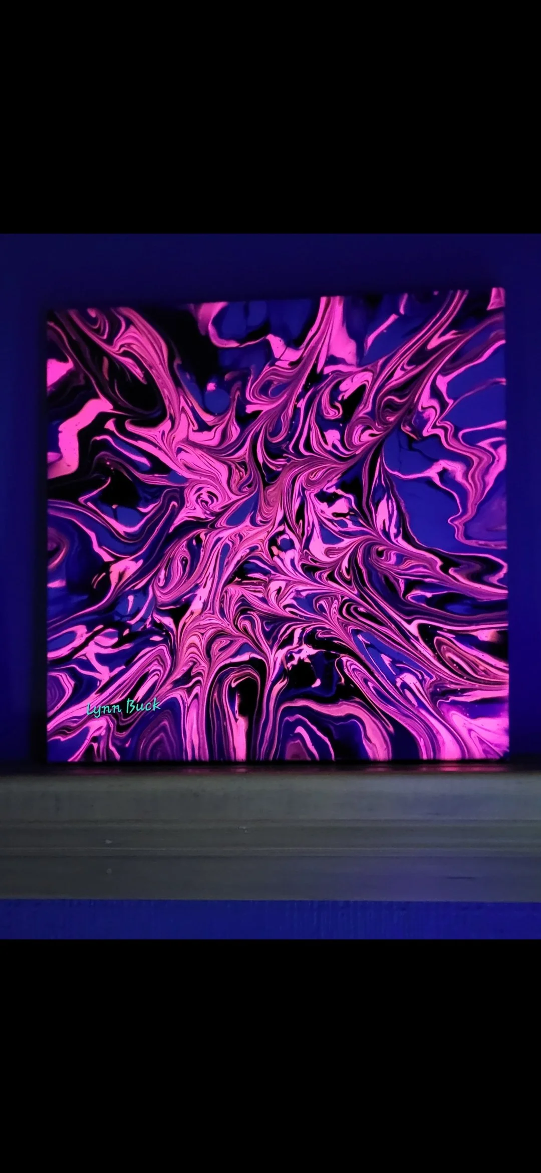 Abstract digital artwork with swirling pink and purple patterns on a black background, signed by Lynn Buck.