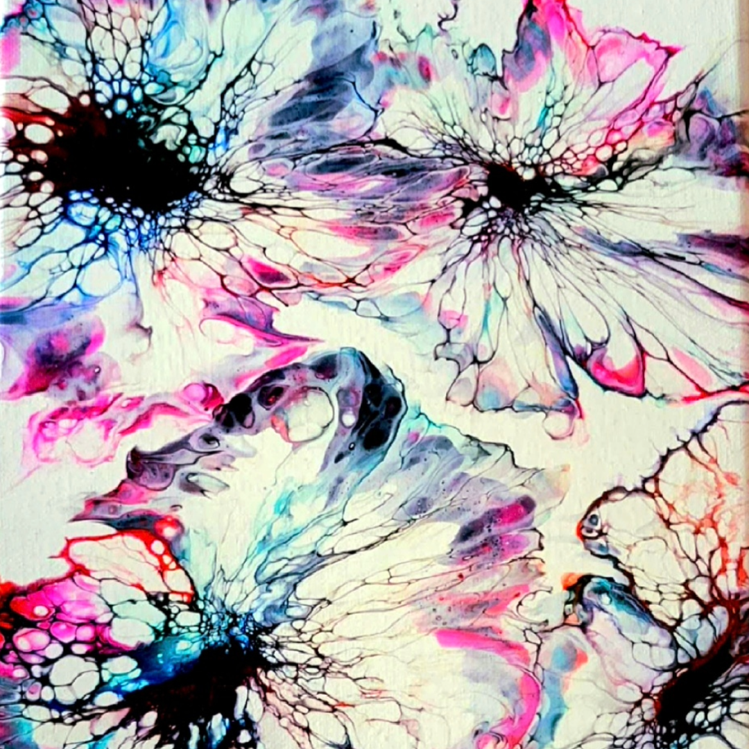Abstract watercolor painting with black, pink, blue, and purple ink patterns resembling floral and insect shapes.